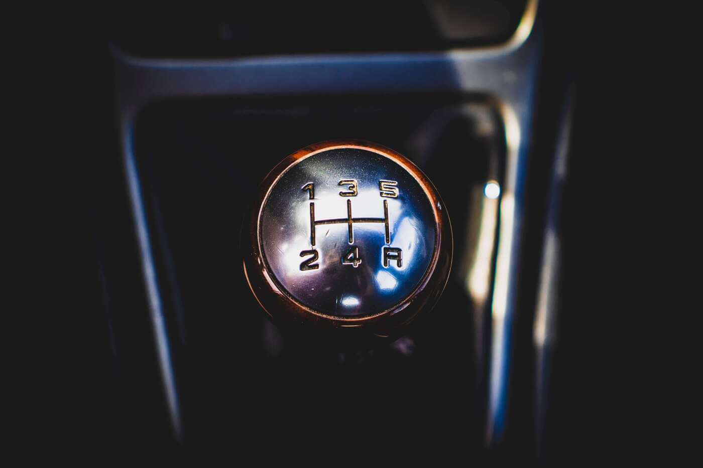 Photo from Hidde van Esch on Unsplash - black and gray automatic vehicle gear shift lever